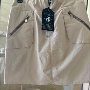 Anatomie Tan Mini Golf Cargo Skirt for Casual Wear. FREE shipping in the US